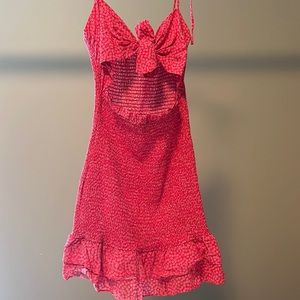 Red dress with bow and cutout